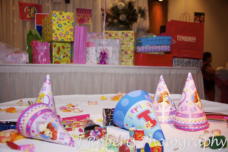 Presents and party hats at first birthday party - party photography sydney